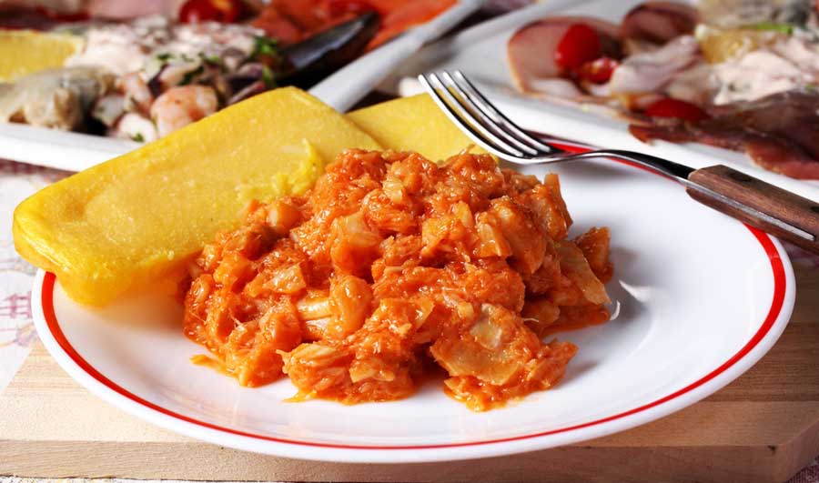 View of a Guanimes on a plate with fork