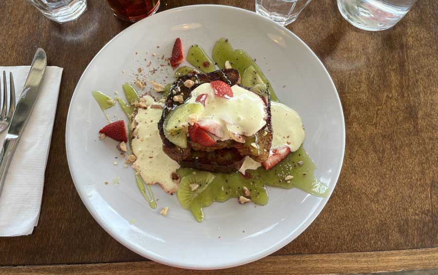 A French toast on a plate served in HEARTS Nashville