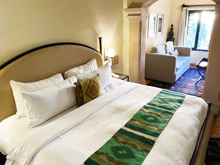 View of the bed and sofa in Hacienda El Santuario