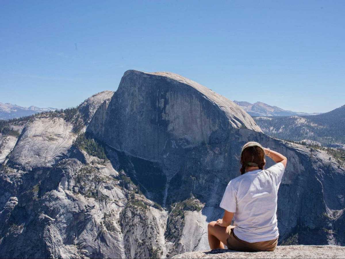 Laura McFarland admiring the view in Half Dome in Yosemite National Park