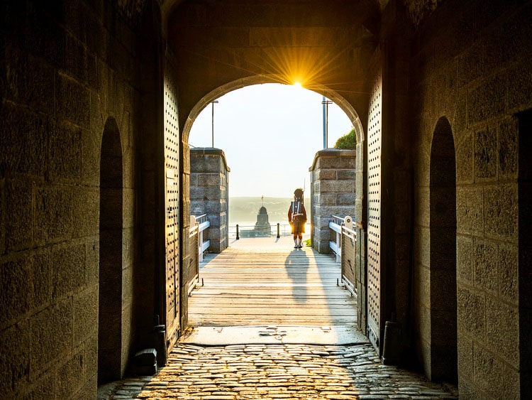 View of military personel at sunset on an arc