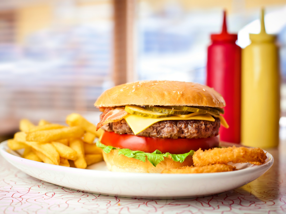 Close up of the fresh hamburger with french fries served at La Bonbonniere