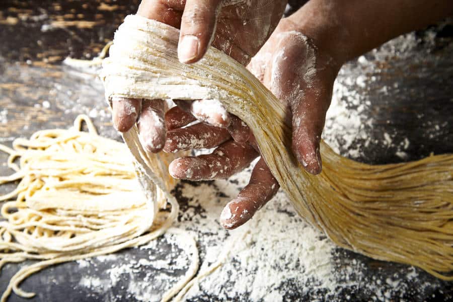 View of the hands making handmade pastas