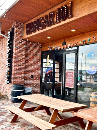 Bench seating area outside the Hangar 101 Bar & Grill