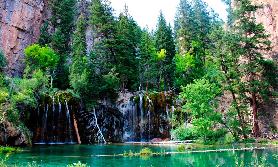 View of a turquoise green water in Hanging Lake in Glenwood Springs