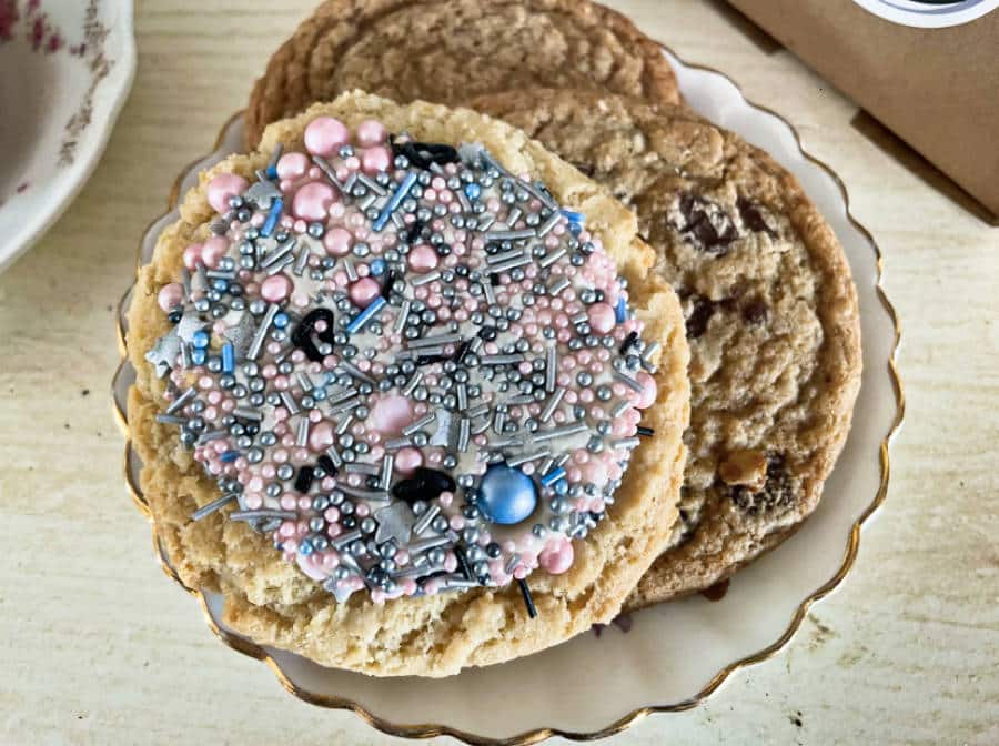 View of different cookies topped with edible beads and sprinkles from Happy Bakeshop