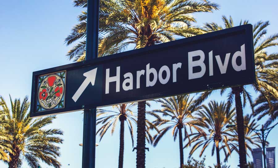 The Harbor Blvd sign on the road