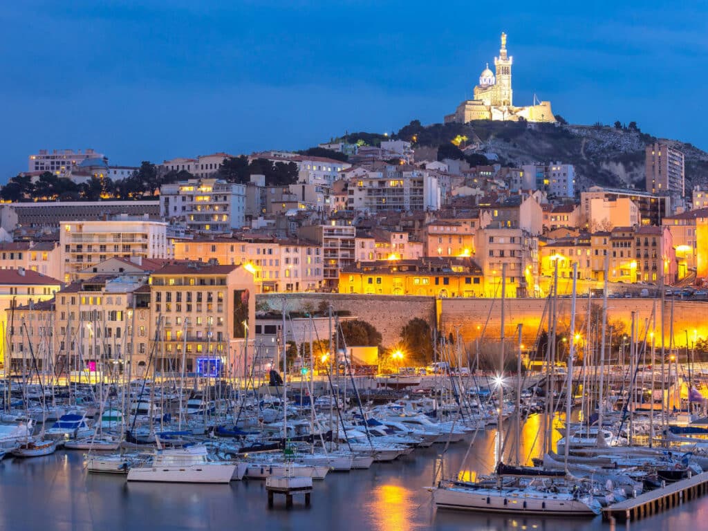 Boats on a harbor in Marseille at night