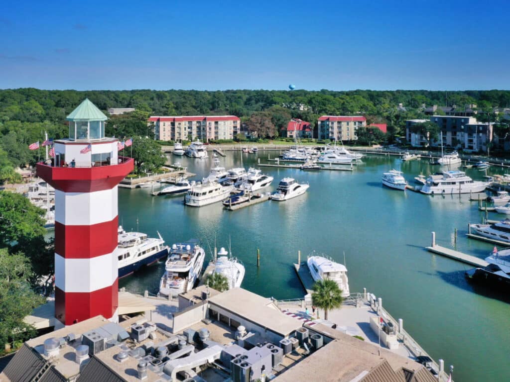Aerial view of a lighthouse and boats at the Harbour Town