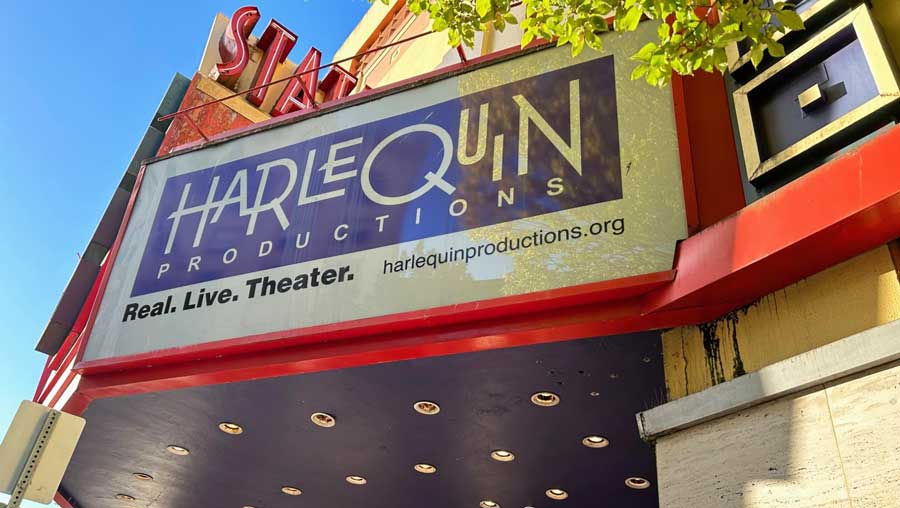 The Harlequin Productions Theater signage at the entrance