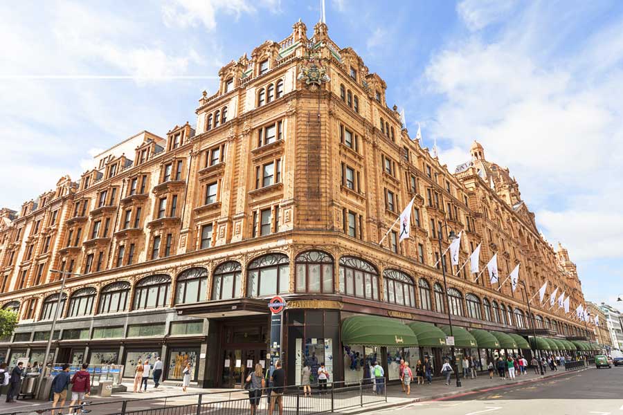 The Harrods building under the clear blue sky
