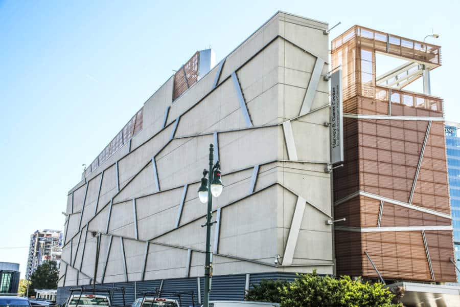 View of the exterior of Harvey B. Gantt Center for African American Arts and Culture with the clear blue sky in the background