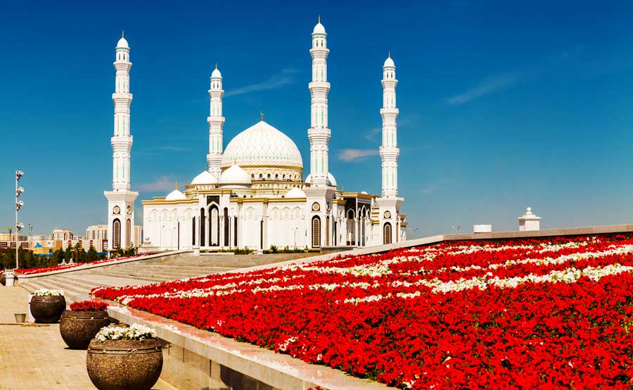 Red and white flower fields outside Hazret Sultan Mosque