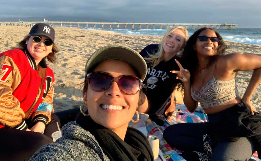 The author with her friends having a picnic in Hermosa Beach