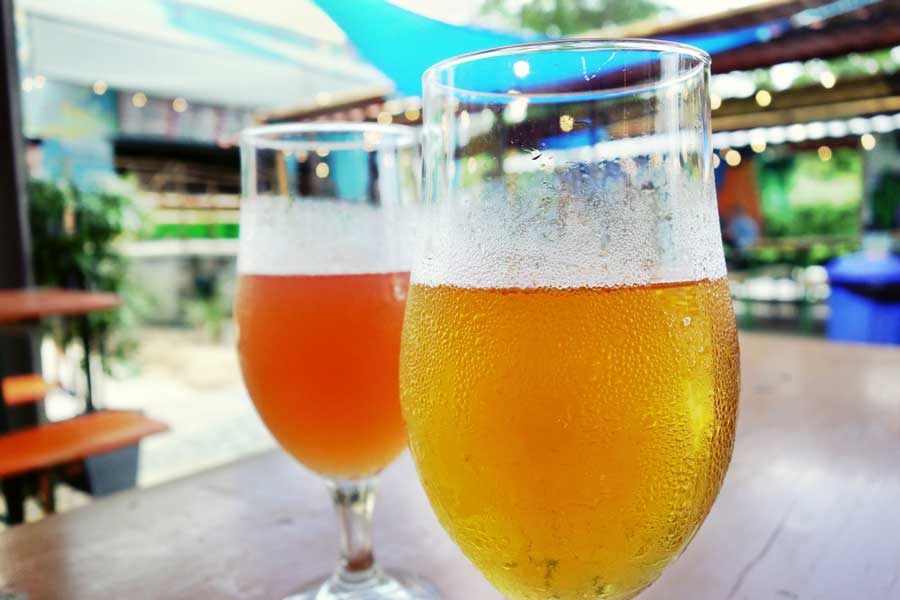 Two glasses of beer from Hi-Wire Brewery
