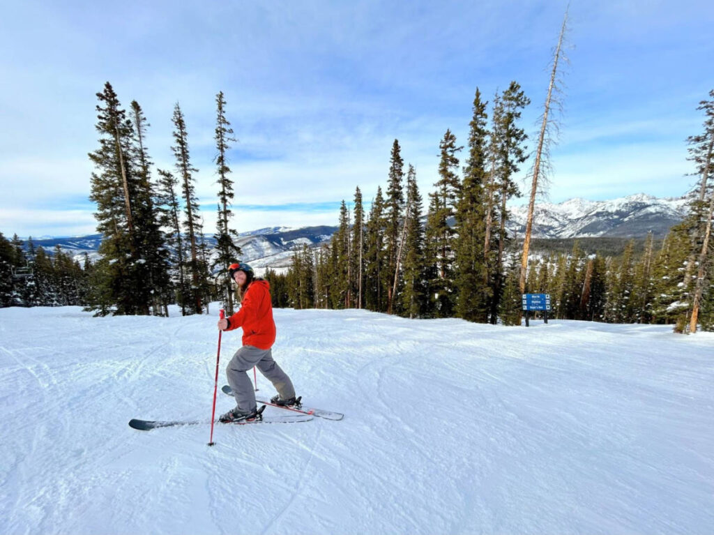 The author's husband smiling for a photo near Highline Express Lift
