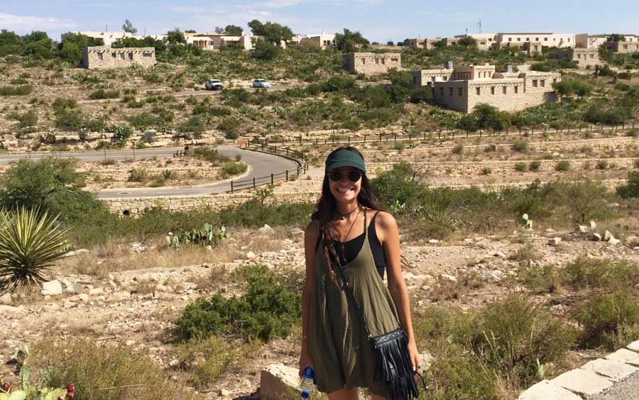 The author smiling for a photo during her hike in Carlsbad Caverns National Park
