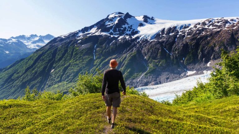 A hiker walking at the Kenai Fjords National Park