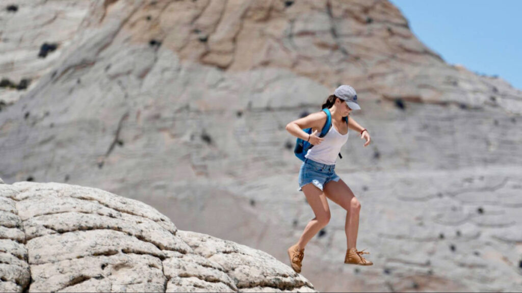 Travel Lemming Writer, Betty Hurd, jumping off a cliff