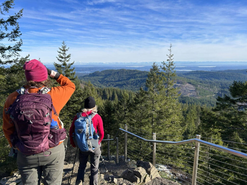 Hikers enjoying the view at the Green Mountain summit
