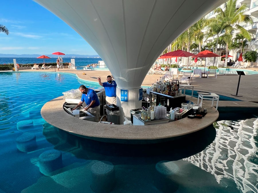 Bartenders on the pool bar in Hilton Riviera Resort