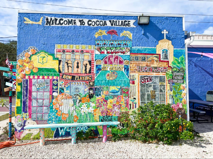 A colorful welcome sign mural of Cocoa Village