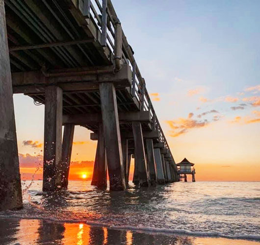 The Naples Pier and the colorful sky during sunset