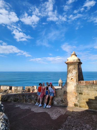 The author, Niamh Hayes with her friends on a historic site in Puerto Rico
