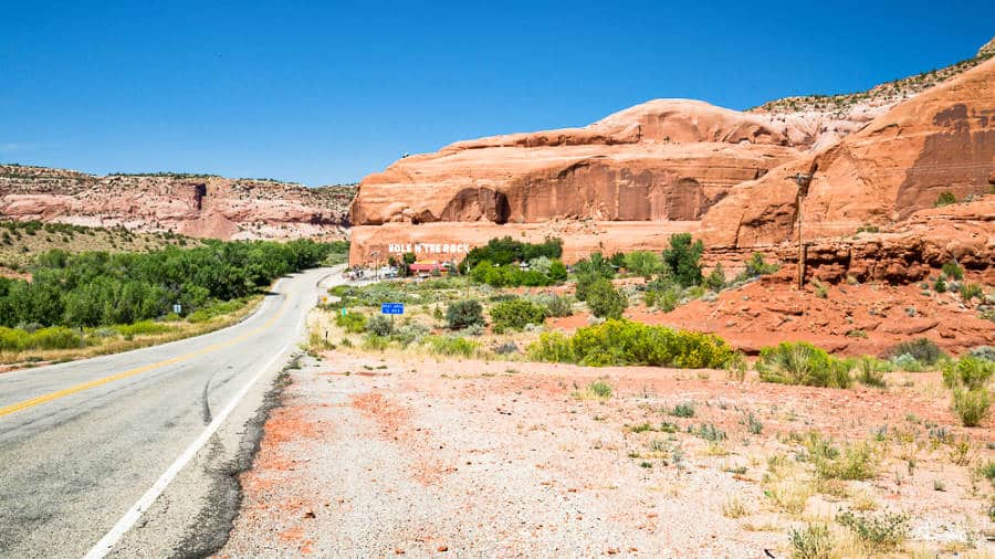 View of the Hole N” the Rock from a distance on the side of the road in Utah