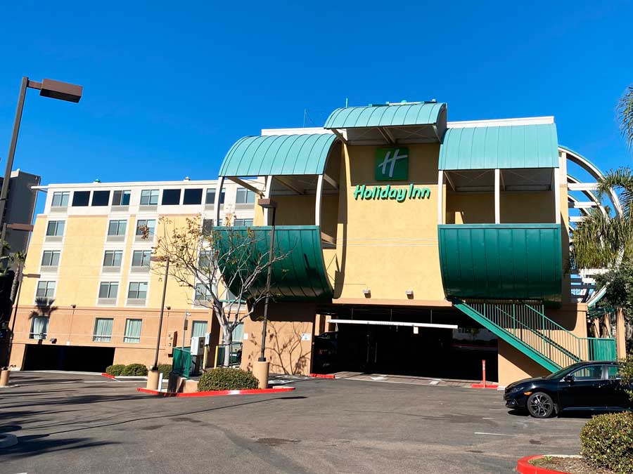 View of the Holiday Inn Oceanside and the clear blue sky above it