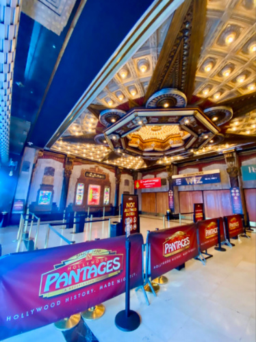 Lobby with high ceiling adorned by a dazzling decorations at Hollywood Pantages Theatre