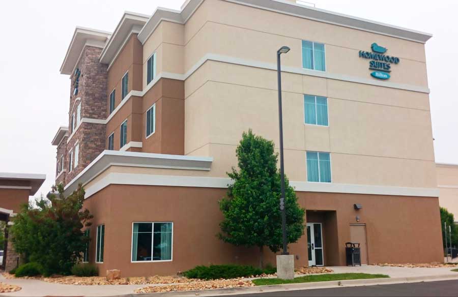 The Homewood Suites building from the outside
