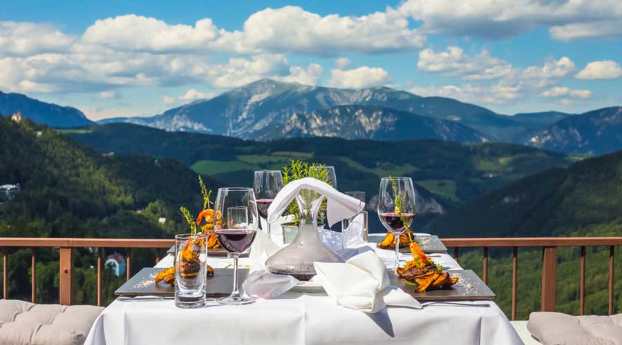 Outdoor dining area with a scenic view in Hortencia’s Restaurant