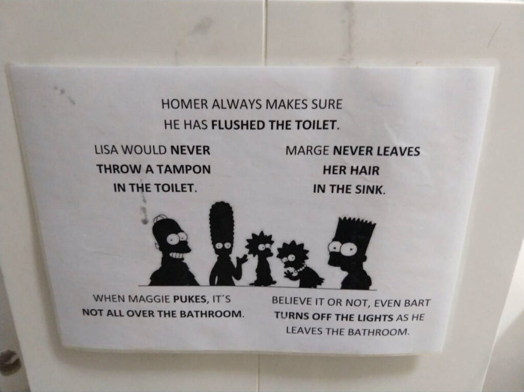 Bathroom Hostel notices featuring the Simpsons