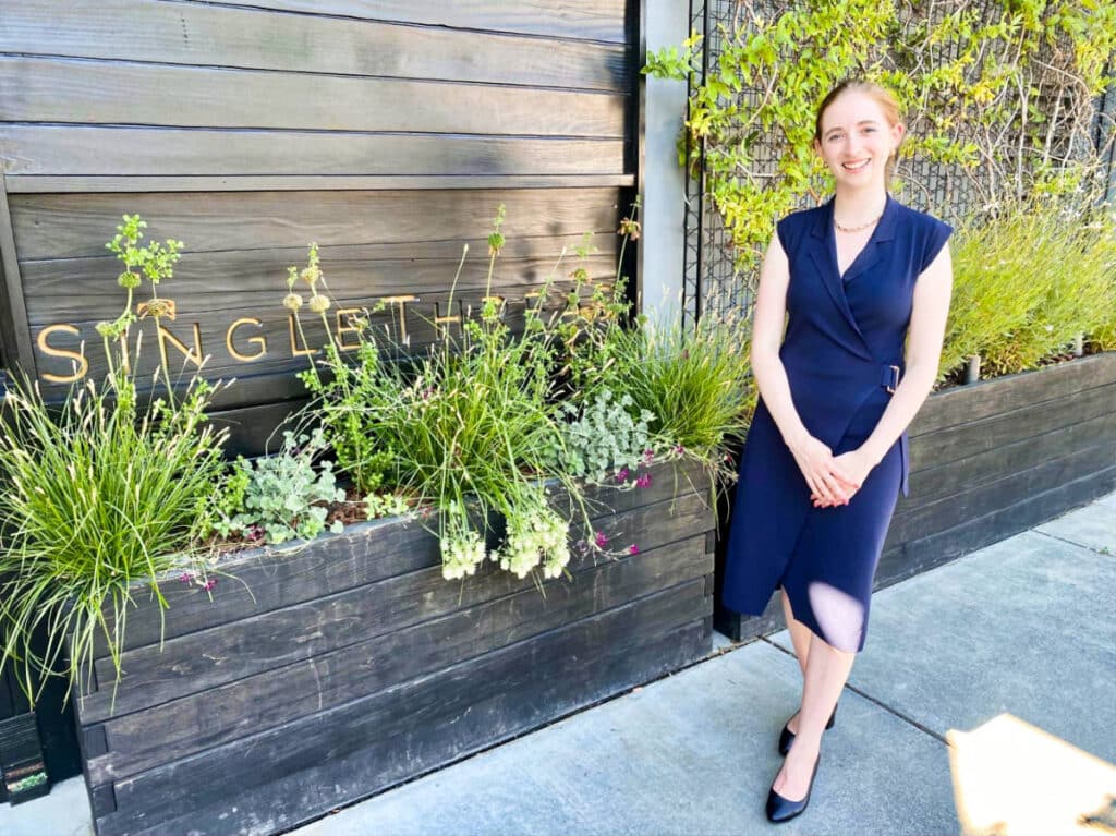 Alexandra, the beautiful hostess, posing outside the SingleThread