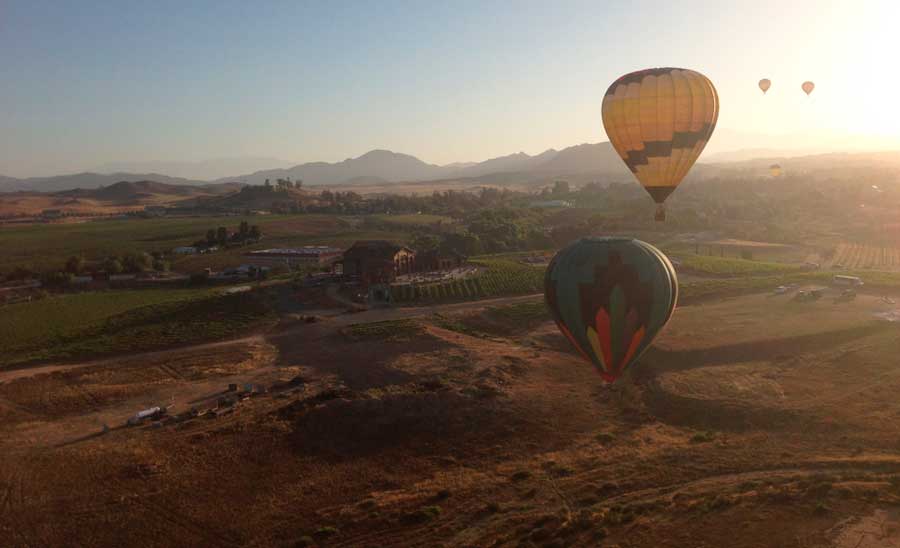 Colorful Hot Air Balloon flying above Temecula