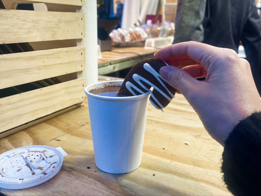 A cup of chocolate and ginger dunker