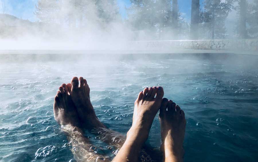 A couples feet on a Hot Springs