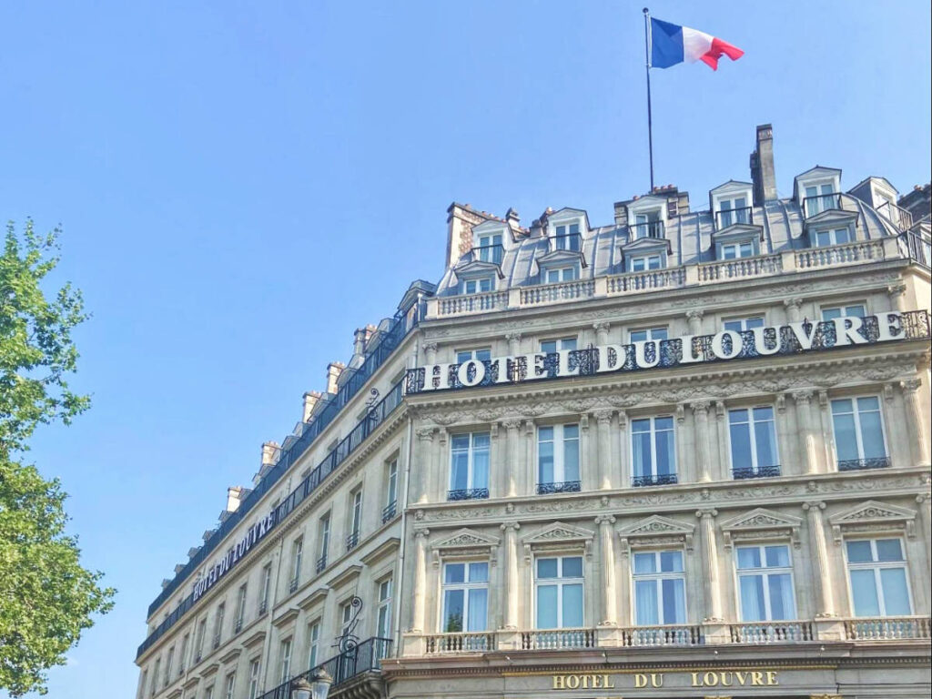 The Hôtel Du Louvre building from the outside