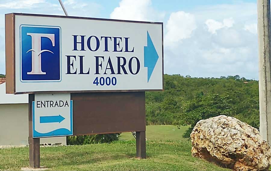 The Hotel El Faro sign on the entrance