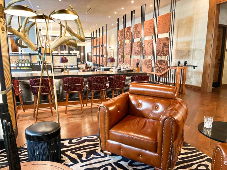 View of the bar counter from the seating area in Hotel Fraye