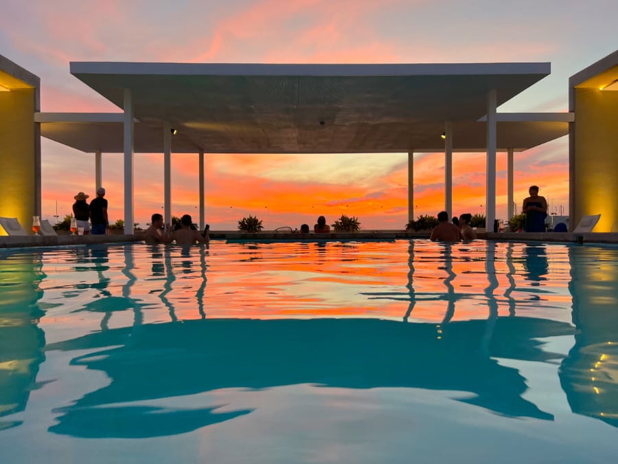 View of the pool and the colorful sky during sunset in Hotel Mio Vallarta