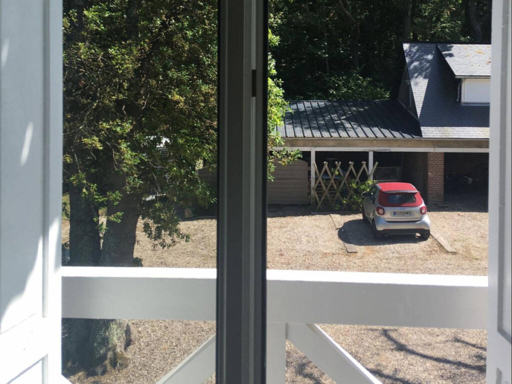 A car on a hotel parking in Normandy