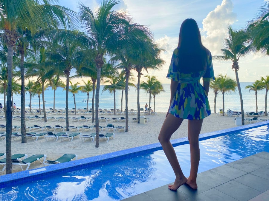 Clara admiring the view of the beach in Hotel Riu Yucatan