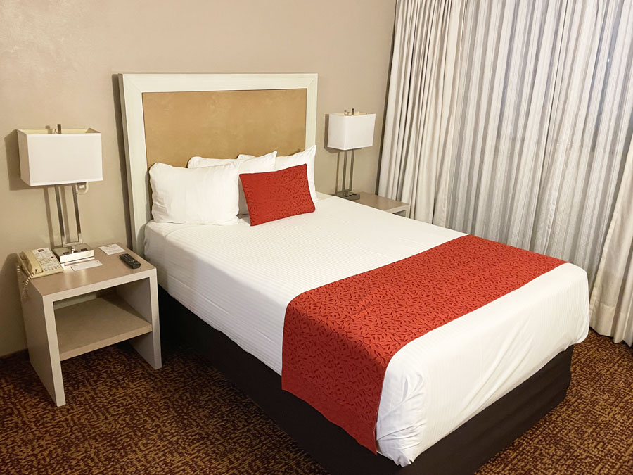 View of a bed in Hotel Stanza