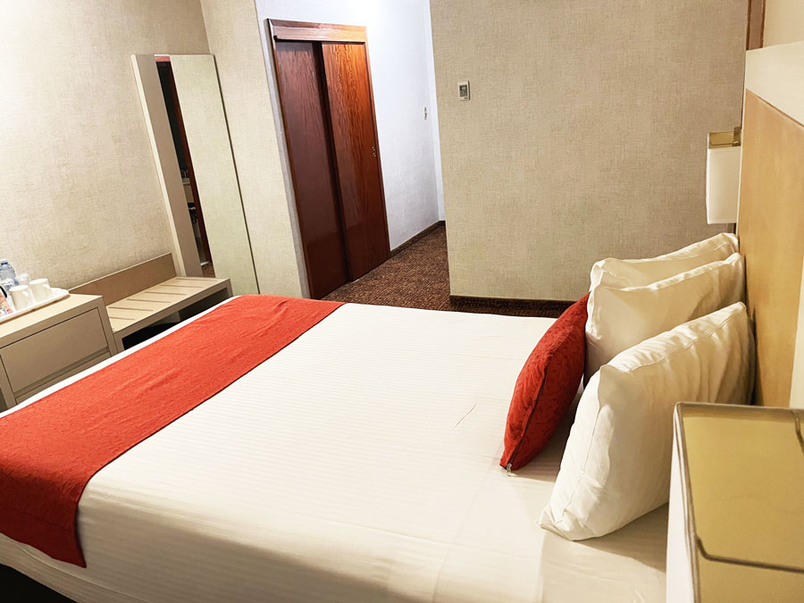 View of the bedroom in Hotel Stanza