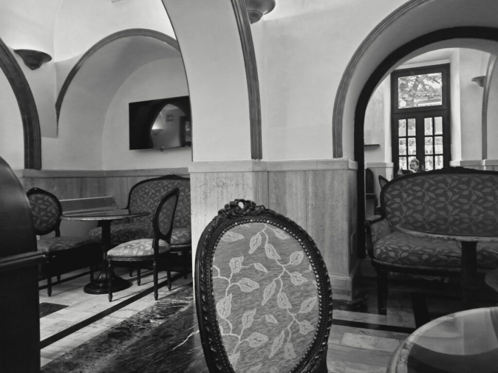 Tables and chairs in a Hotel lobby in Rome