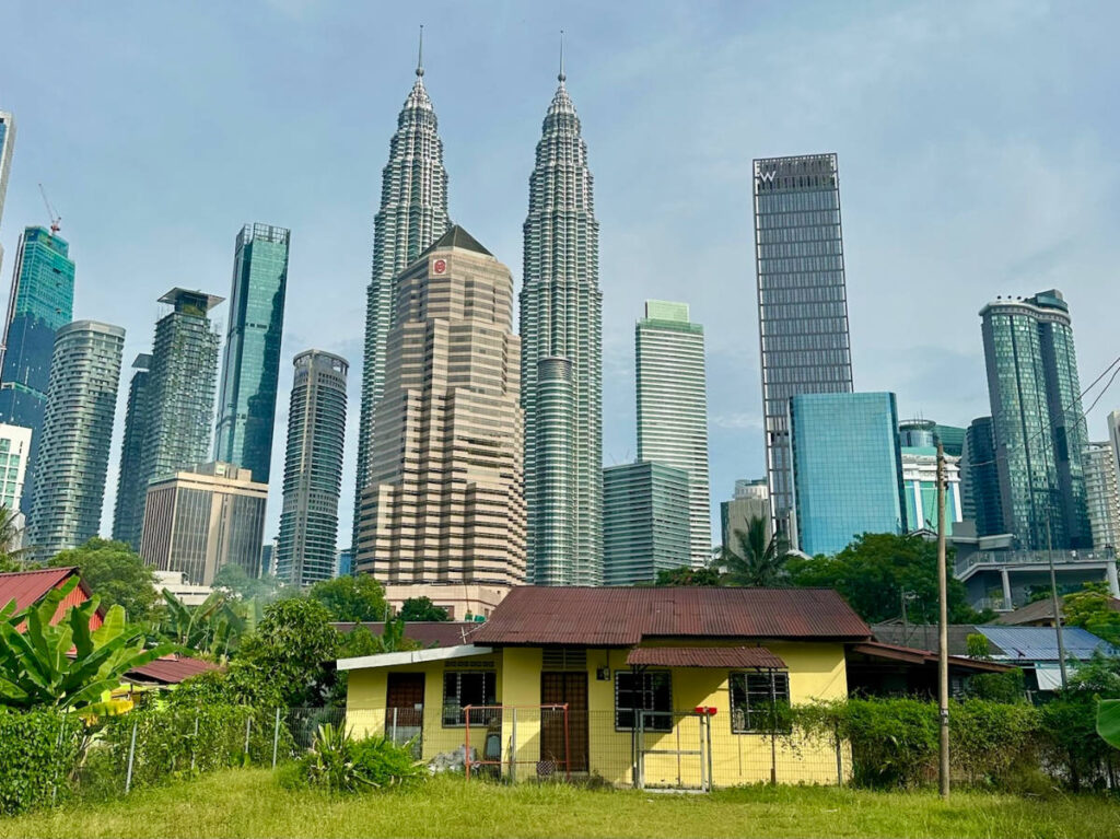 View of a House in the Kampung Baru neighborhood surrounded by high rise buildings