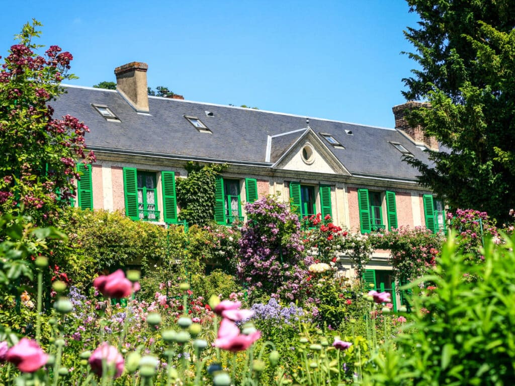 Clear blue sky over the House of Claude Monet and its garden