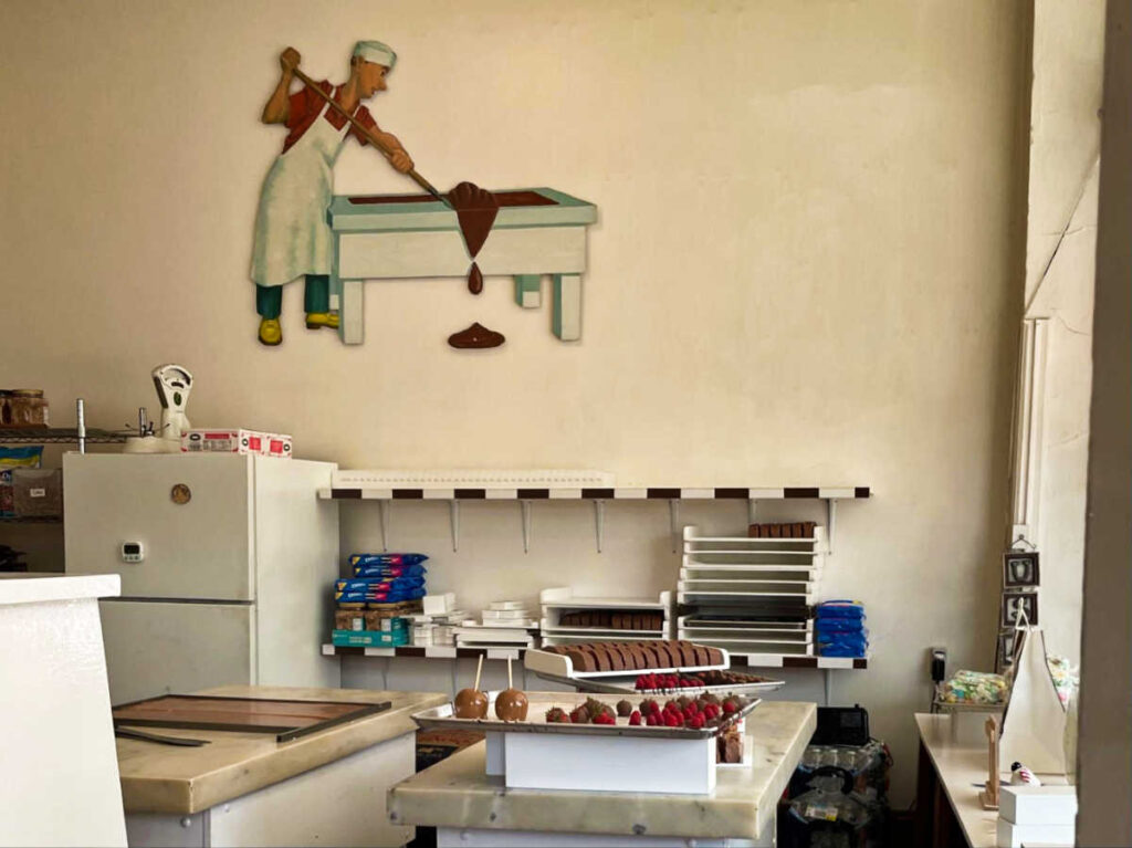View inside the kitchen with a mural of a baker mixing the chocolate fudge